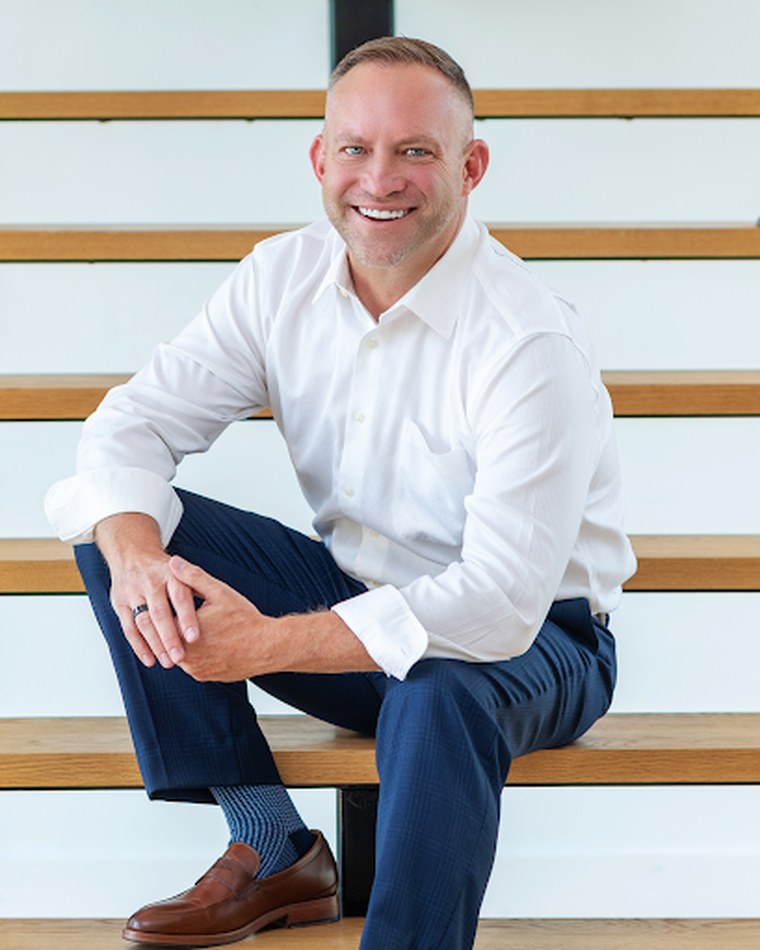 Jamie Buck, Realtor, seated portrait